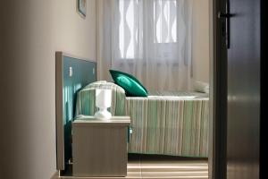 Postel nebo postele na pokoji v ubytování B&B Z'Angelina