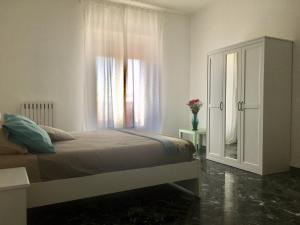 Postel nebo postele na pokoji v ubytování A Casa di Tilde