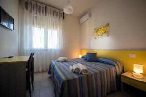 Postel nebo postele na pokoji v ubytování B&B Z'Angelina
