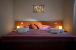 Postel nebo postele na pokoji v ubytování B&B Z'Angelina