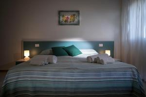 Postel nebo postele na pokoji v ubytování B&B Z'Angelina