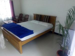 Postel nebo postele na pokoji v ubytování Dream Nest Resorts