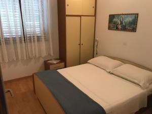 Postel nebo postele na pokoji v ubytování Croatia Mandre