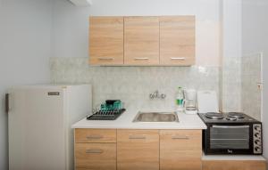 Köök või kööginurk majutusasutuses Pefkides Aegina Boutique Apartments