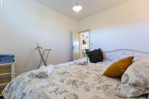 Ein Bett oder Betten in einem Zimmer der Unterkunft Apartments Karla & Marija