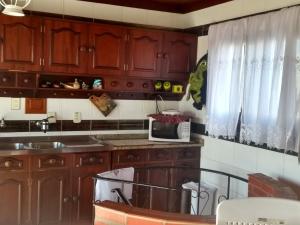 Cucina o angolo cottura di Duplex Tramandaí