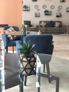 Posezení v ubytování 4Guest Hotel