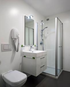 Kúpeľňa v ubytovaní Gardabike Residence