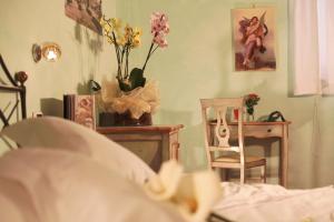 A bed or beds in a room at Relais Ristori