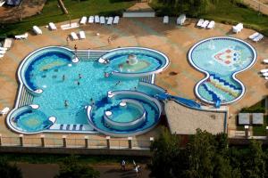 an overhead view of a large swimming pool at Silver DeLux Apartman in Balatonfüred