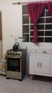 Apartamento kitchenette tesisinde mutfak veya mini mutfak