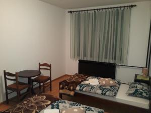 Postel nebo postele na pokoji v ubytování Apartman Luka