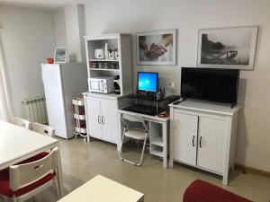 Kuchyň nebo kuchyňský kout v ubytování Hostal Las Eras