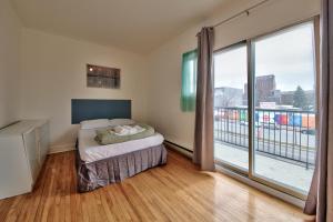 Postel nebo postele na pokoji v ubytování Hotel Mini Inc