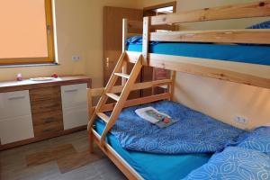 Postel nebo postele na pokoji v ubytování Apartma Marjetica II.