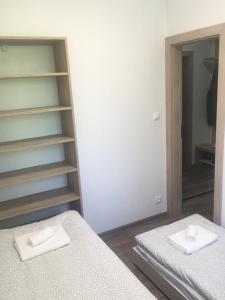 Postel nebo postele na pokoji v ubytování Apartmán Lomnička - Tatranská Lomnica - Krásny výhľad na Vysoké Tatry
