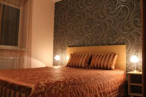 Cama ou camas em um quarto em B Apartment in Vilnius