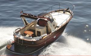 a small boat in the water on the water at Hotel Argentina in Santa Margherita Ligure