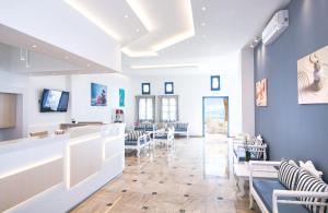 Telewizja i/lub zestaw kina domowego w obiekcie Hotel Sunshine
