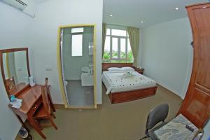 Letto o letti in una camera di Virtue Highland Hotel