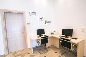 Telewizja i/lub zestaw kina domowego w obiekcie Hotel Sunshine