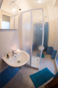 Een badkamer bij Le Dimore del Sole LT