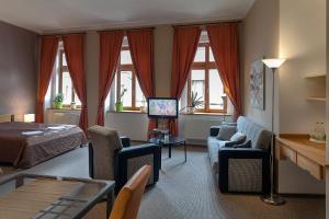 Postel nebo postele na pokoji v ubytování Hotel Merlot