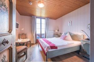Letto o letti in una camera di Hotel Fassbind Beausite