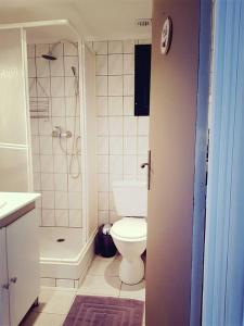 Kúpeľňa v ubytovaní Sur Un Petit Nuage