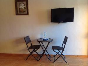 TV a/nebo společenská místnost v ubytování Casona de Cantera
