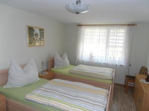 Postel nebo postele na pokoji v ubytování Ferienhaus Golm, 04924 Zobersdorf