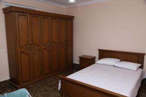 Postel nebo postele na pokoji v ubytování Guesthouse in Batumi