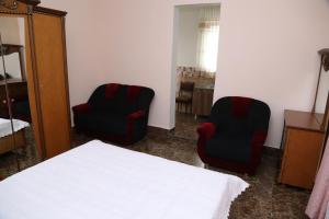 Postel nebo postele na pokoji v ubytování Guesthouse in Batumi
