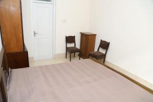 Postel nebo postele na pokoji v ubytování Guesthouse in Batumi