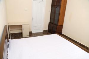 Postel nebo postele na pokoji v ubytování Guesthouse in Batumi