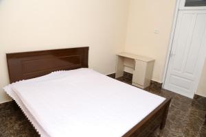 Postel nebo postele na pokoji v ubytování Guesthouse in Batumi
