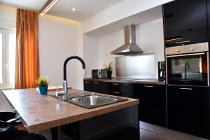 Kuchyňa alebo kuchynka v ubytovaní Besker Apartment
