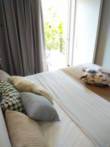 A bed or beds in a room at Limonchello