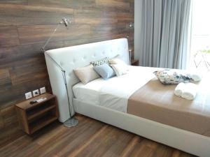 A bed or beds in a room at Limonchello