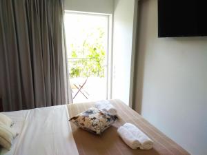 A bed or beds in a room at Limonchello