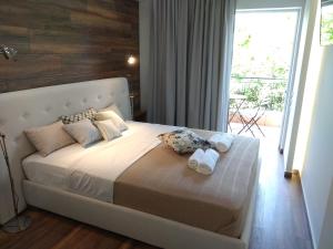 A bed or beds in a room at Limonchello