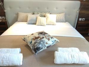 A bed or beds in a room at Limonchello