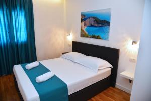 Posteľ alebo postele v izbe v ubytovaní Besker Apartment