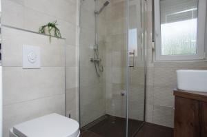 Kúpeľňa v ubytovaní Besker Apartment