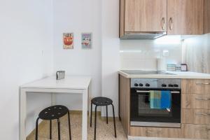 A kitchen or kitchenette at Stylish Athenian Flat