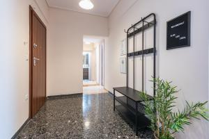 A television and/or entertainment centre at Stylish Athenian Flat