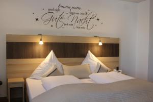 Postel nebo postele na pokoji v ubytování Hotel Baldus