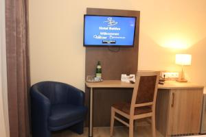 TV a/nebo společenská místnost v ubytování Hotel Baldus