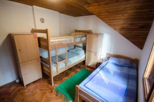 Letto o letti in una camera di Rustic Home Tara