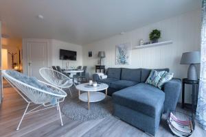Μια τηλεόραση ή/και κέντρο ψυχαγωγίας στο Tore Hunds Apartments